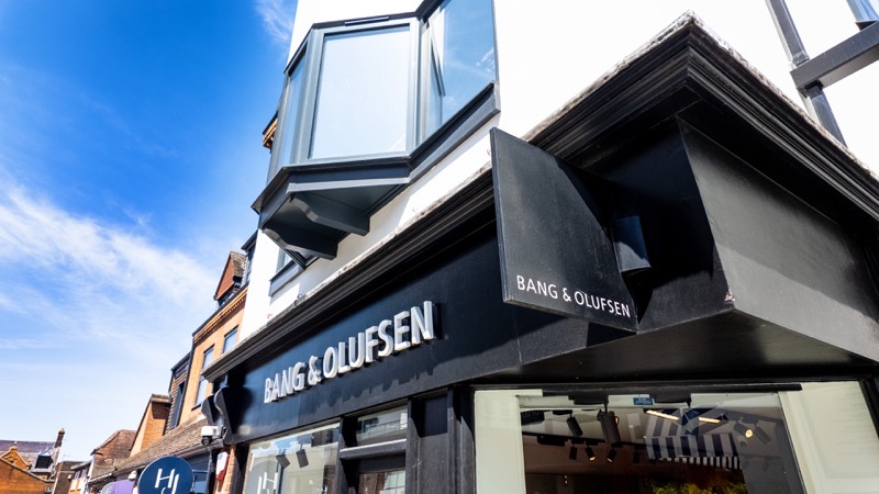 Bang and Olufsen store frontage with audio equipment displayed in the window